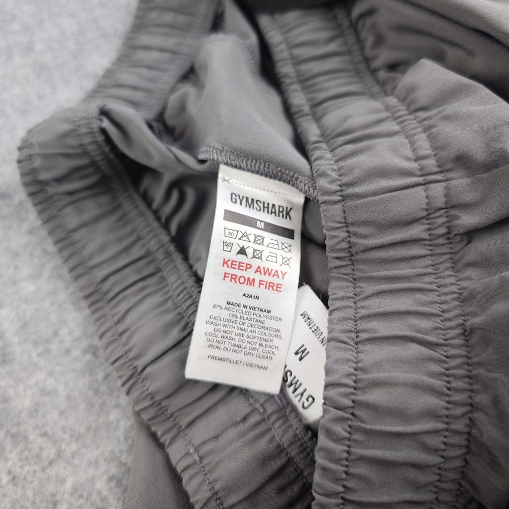 Gymshark Arrival Woven Joggers Mens Medium Silhouette Gray Zip Ankle Slim - Picture 10 of 13